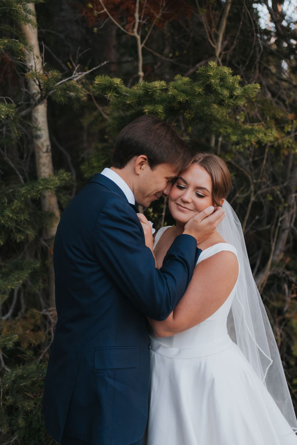 A couple embraces during their affordable Utah elopement
