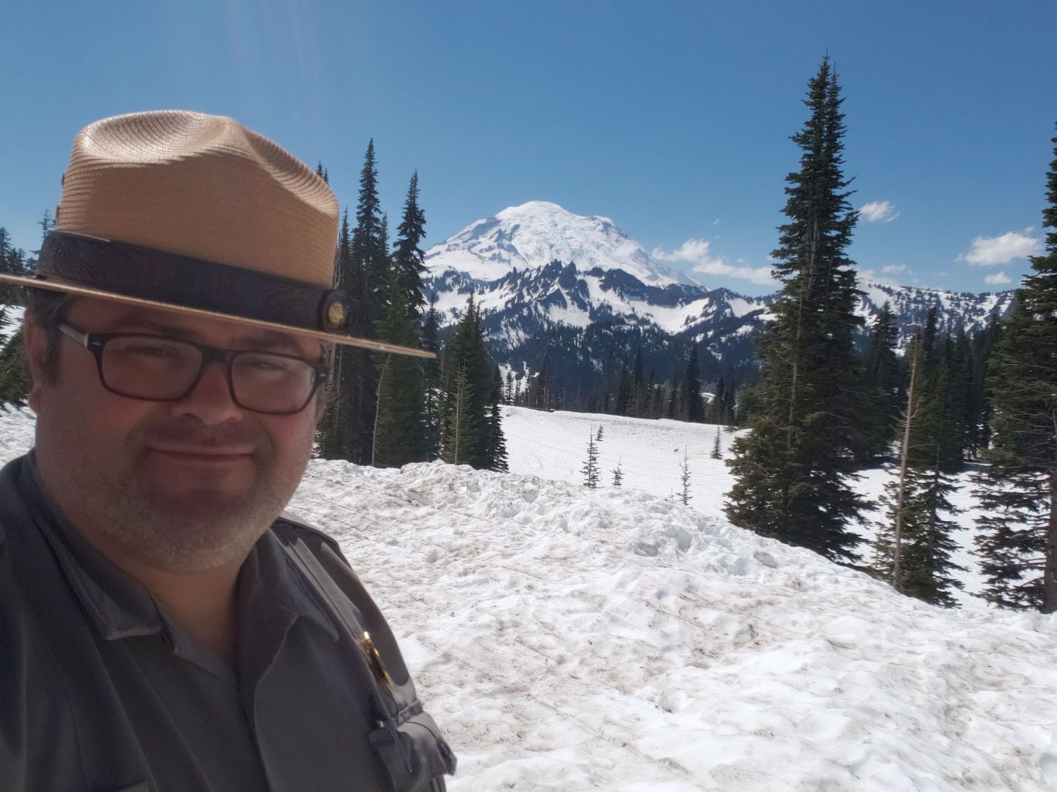 Photo of Cory J. Cravatta in a National Park Service Uniform at Mount Rainier National Park, Washington