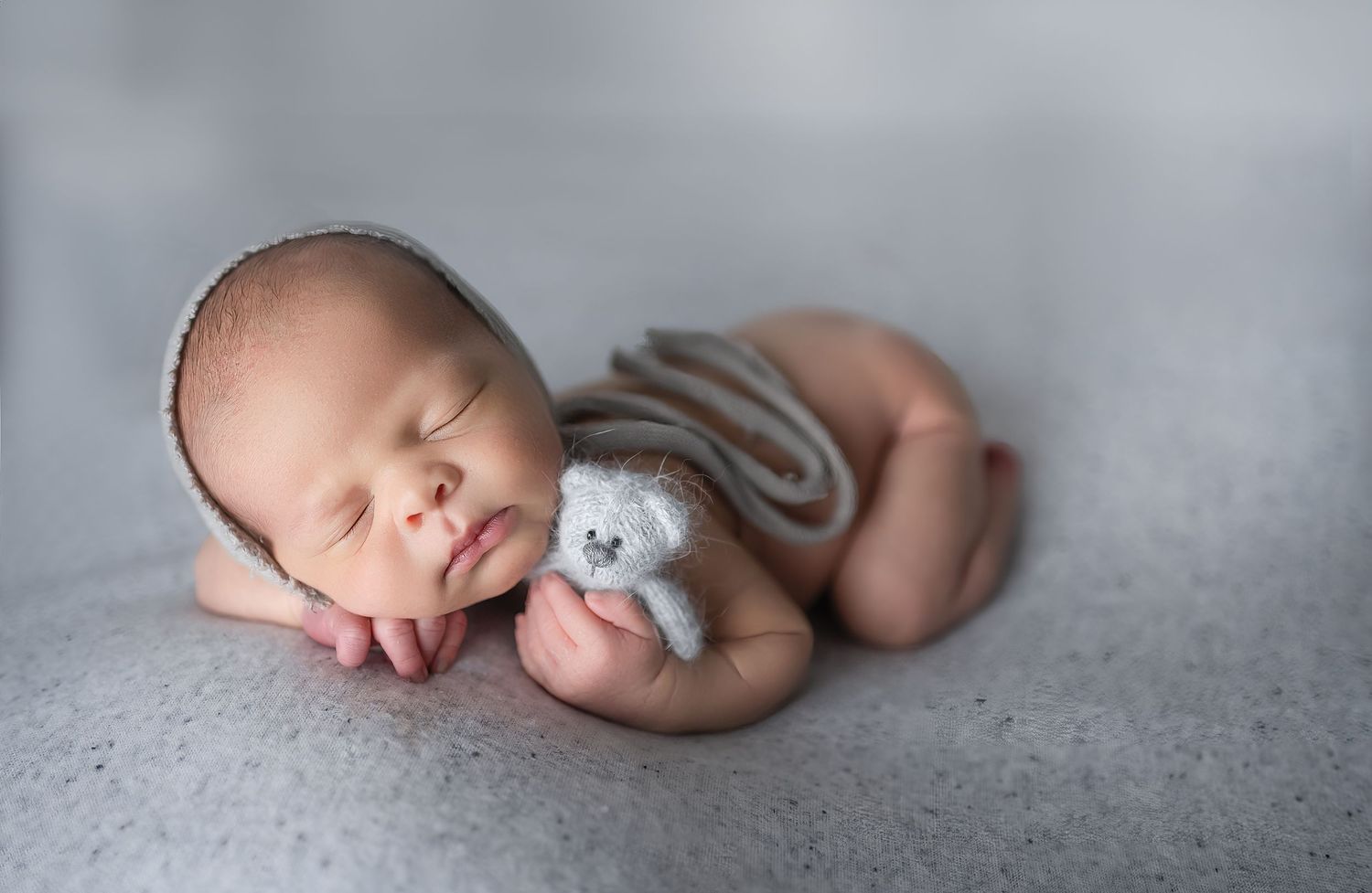 Boy with bear - Newborn photography session in Clarksville TN