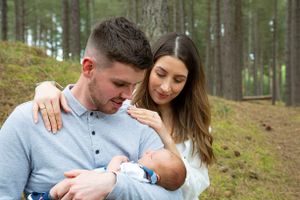 mum and dad with new baby