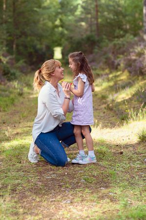 mum and daughter sharing a moment
