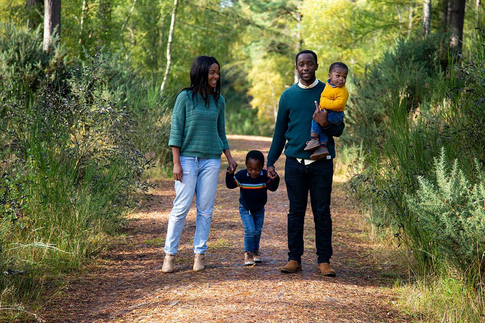family walking down a country path.