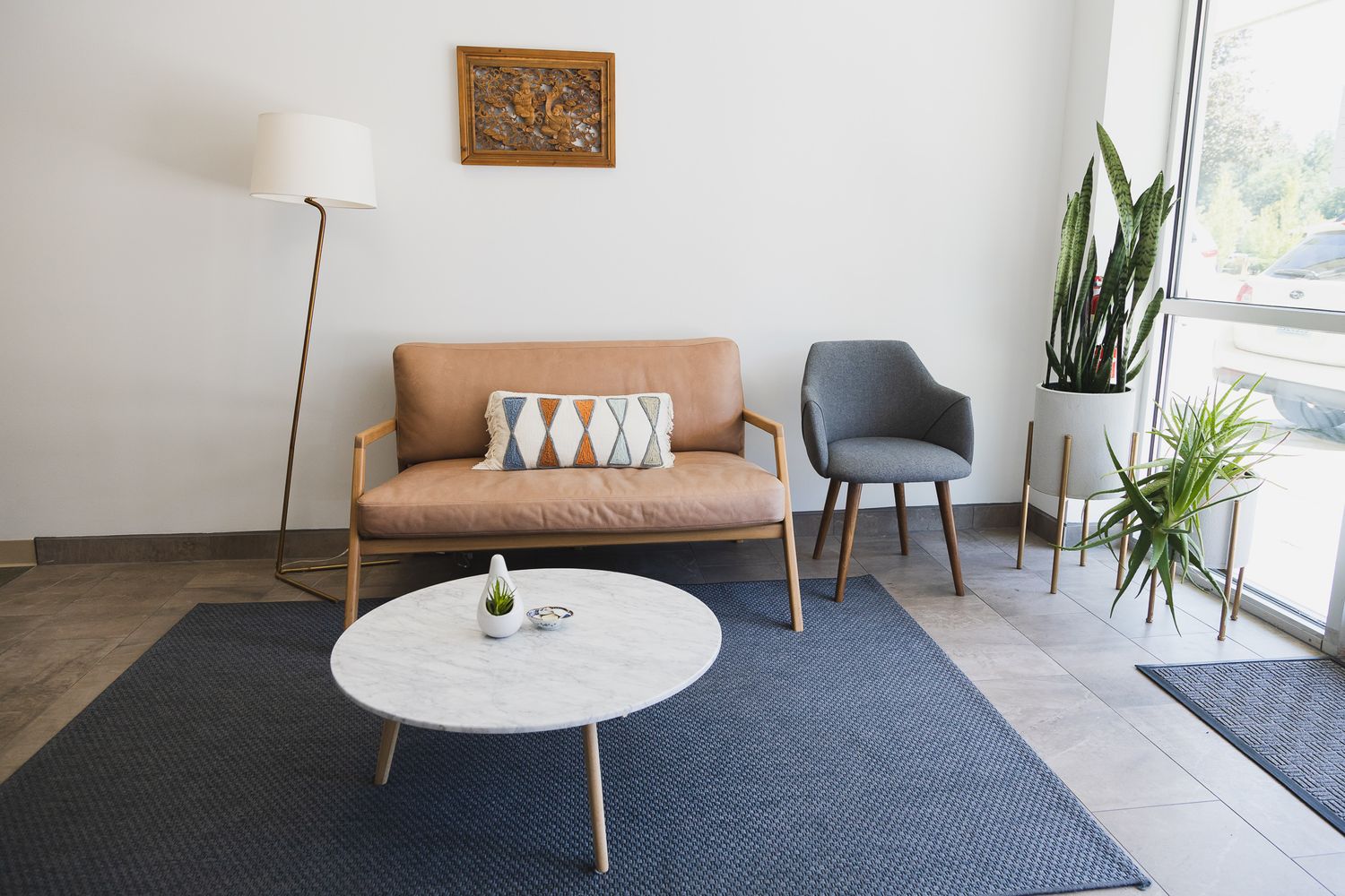 Maple Valley Acupuncture branding photo of lobby waiting area of space couch, chair table, lap