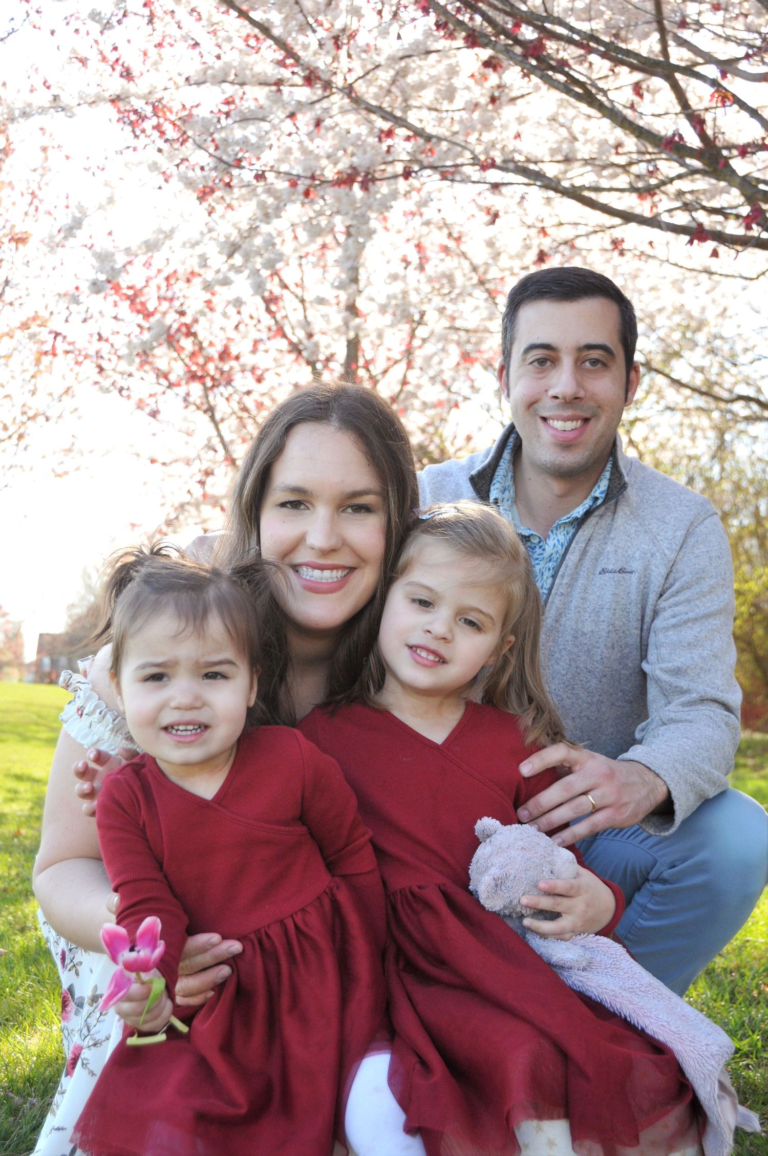 color photo of family outside in spring