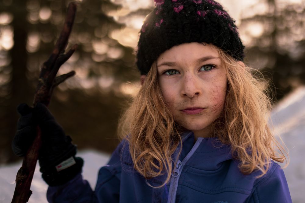 Portrait of a girl with a dirty face