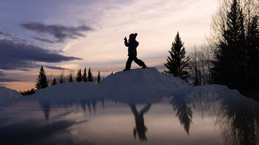 Silhouette of a kid adventuring