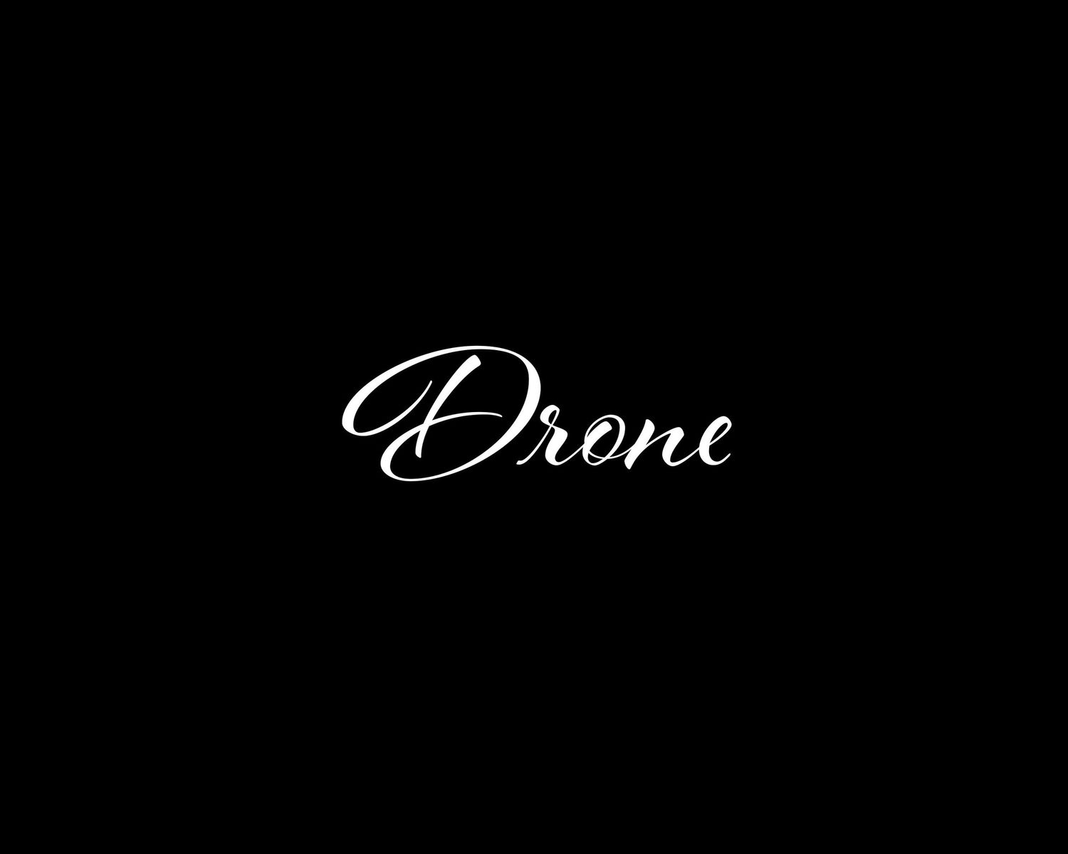 Stylized cursive text design on dark background.