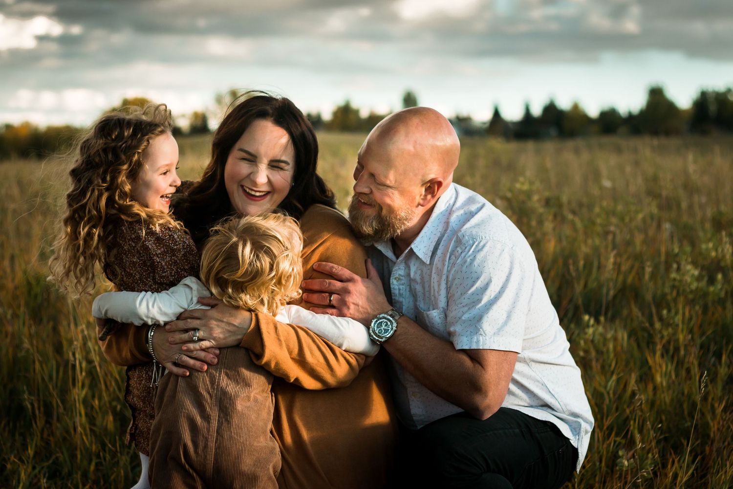 Beautiful authentic family photos during fall in Fish Creek Park, Calgary AB by lifestyle photographer.