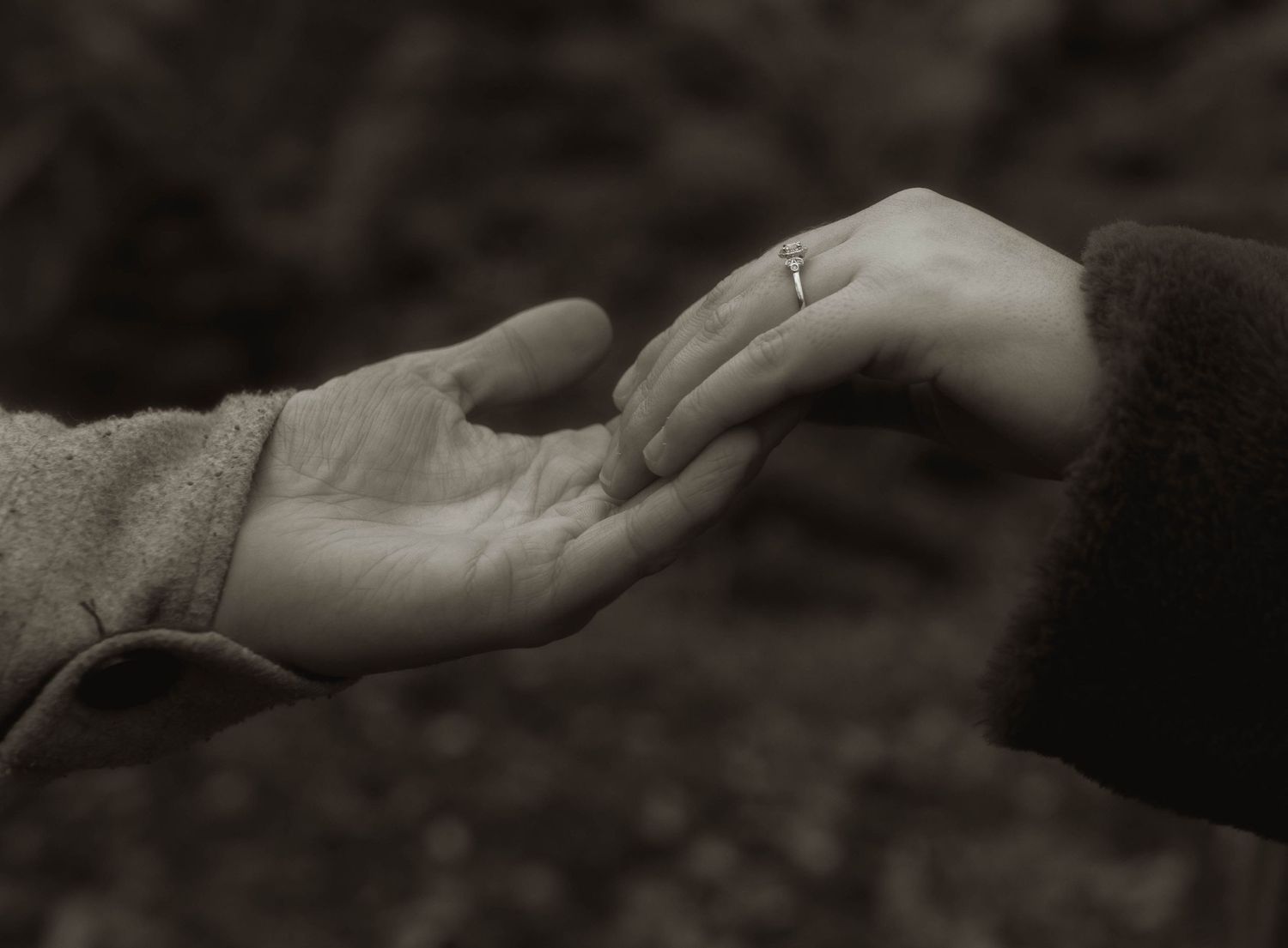 hands touching elopement meaningful moments
