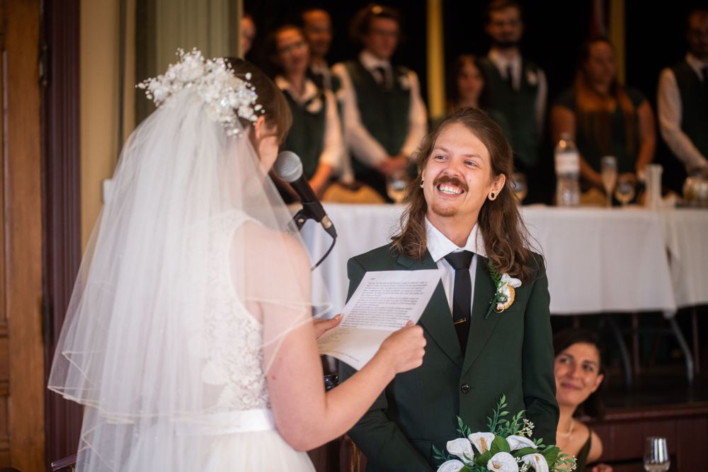 wedding ceremony vows close up bride and groom acton town hall interior