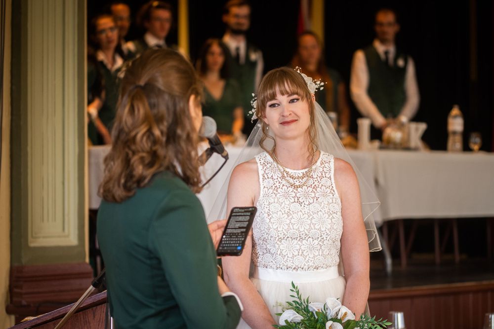 wedding ceremony vows close up bride and groom acton town hall interior