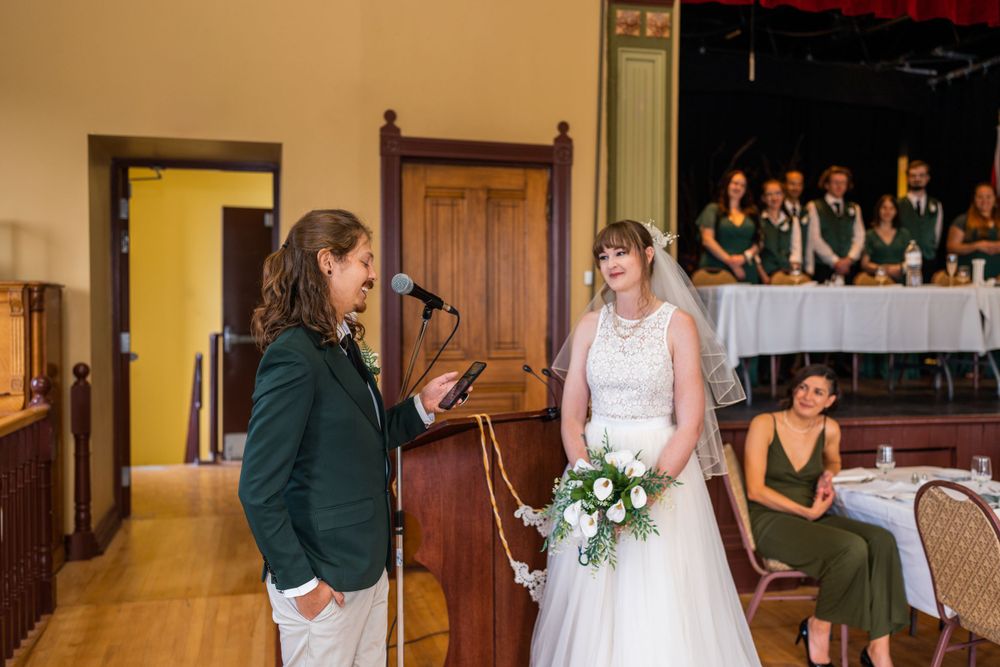wedding ceremony vows bride and groom acton town hall interior