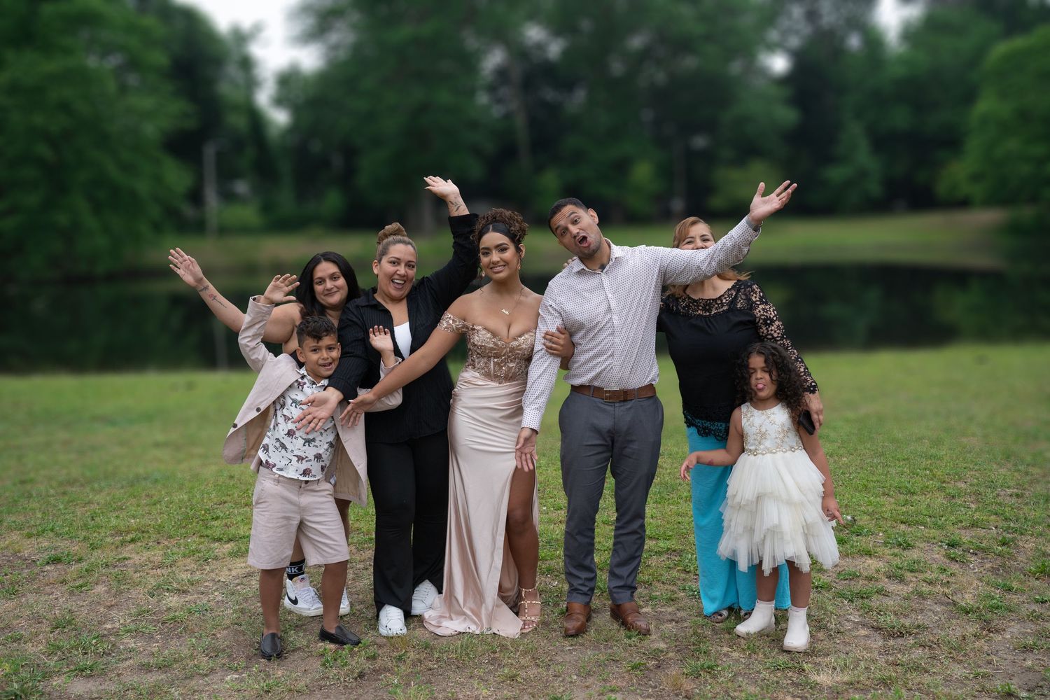 Group photos showing joyful celebration moments in a park setting.