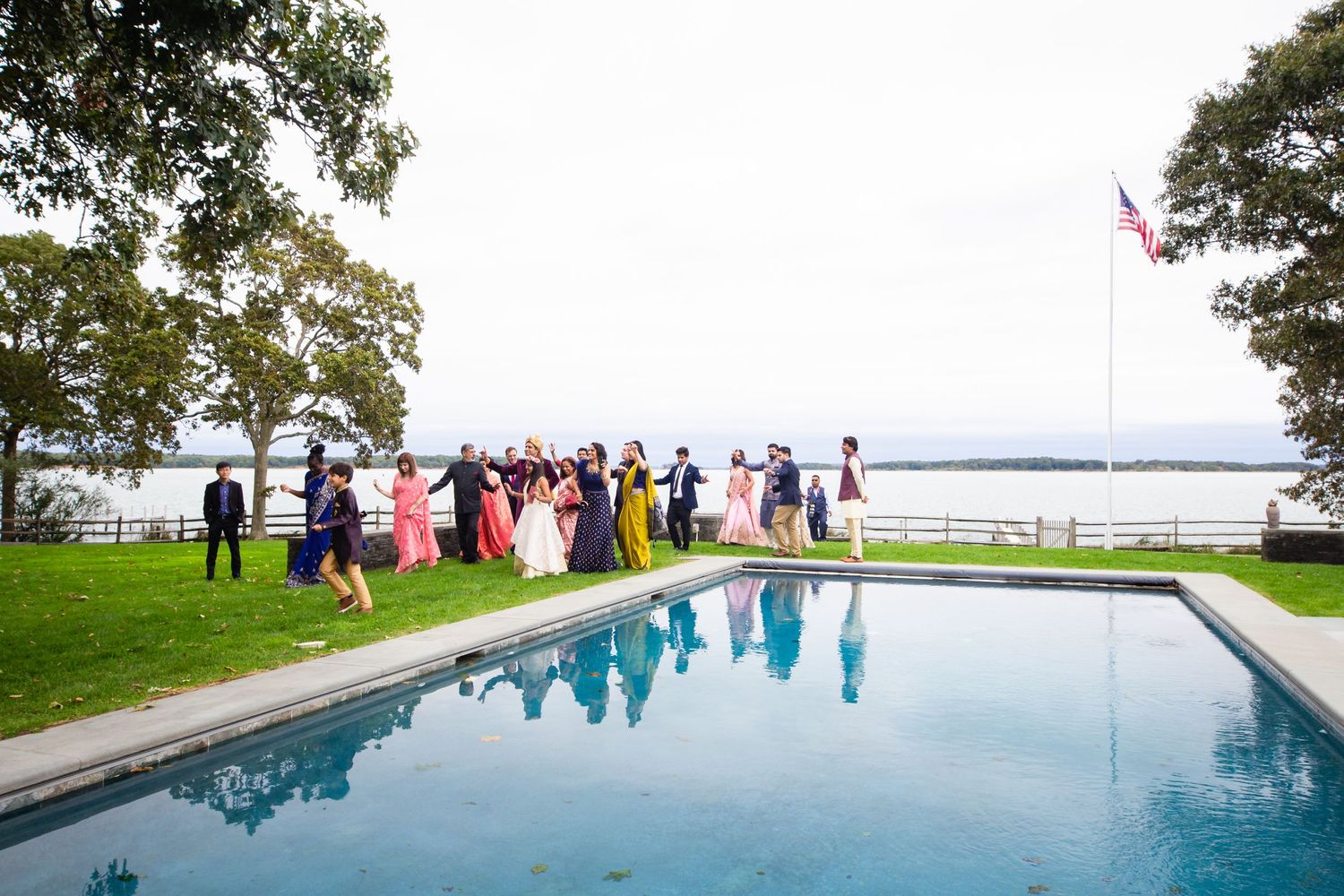 A backyard wedding photograph near swimming pool in Long Island.