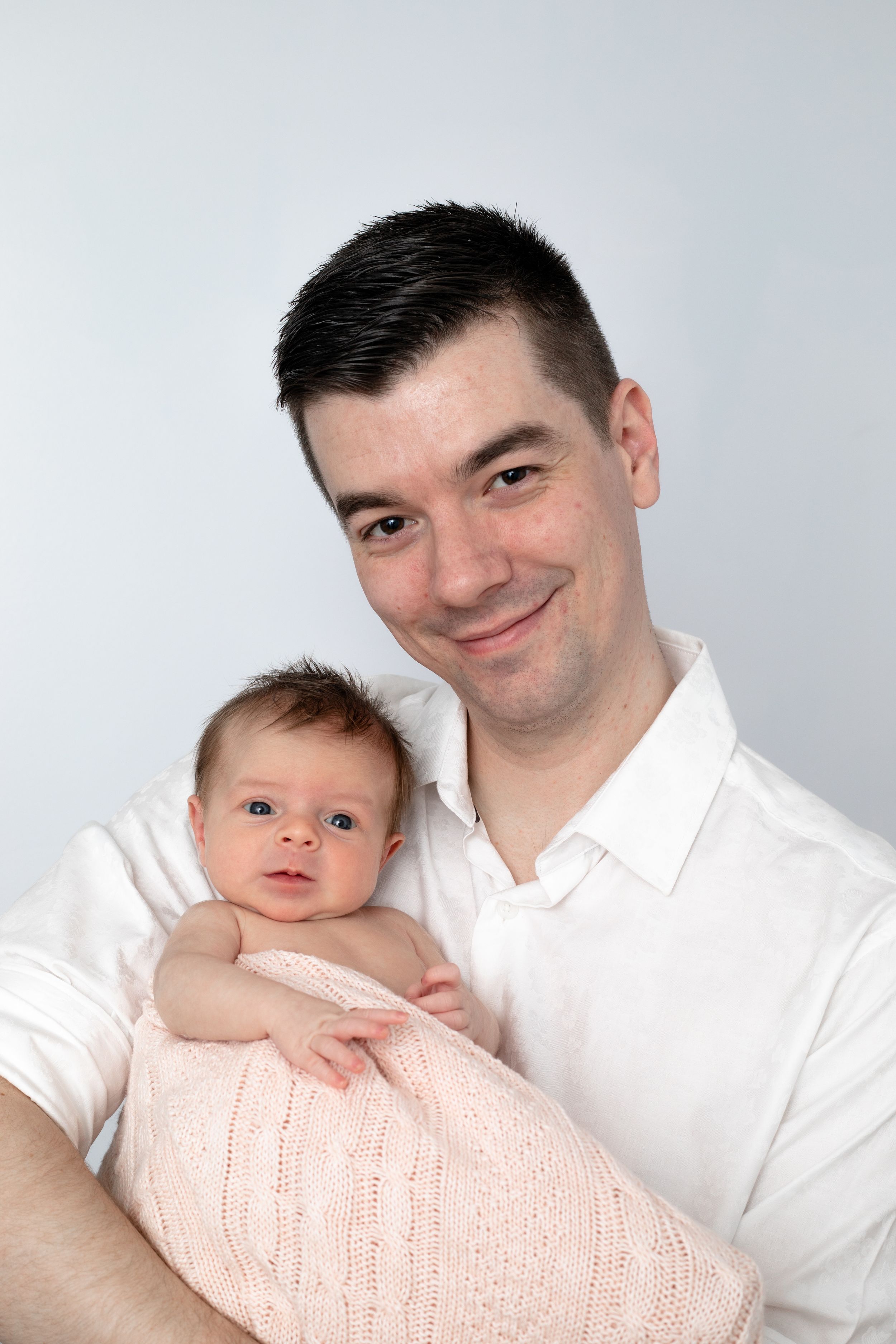 Baby new born portrait photographer, event photographer with father