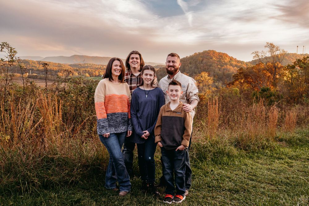 family of 5 in mountainous fall photo