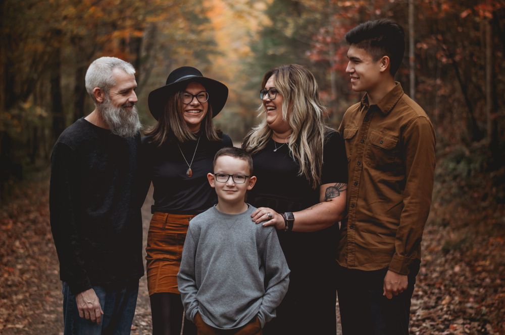 family of 5 laughing in fall photo