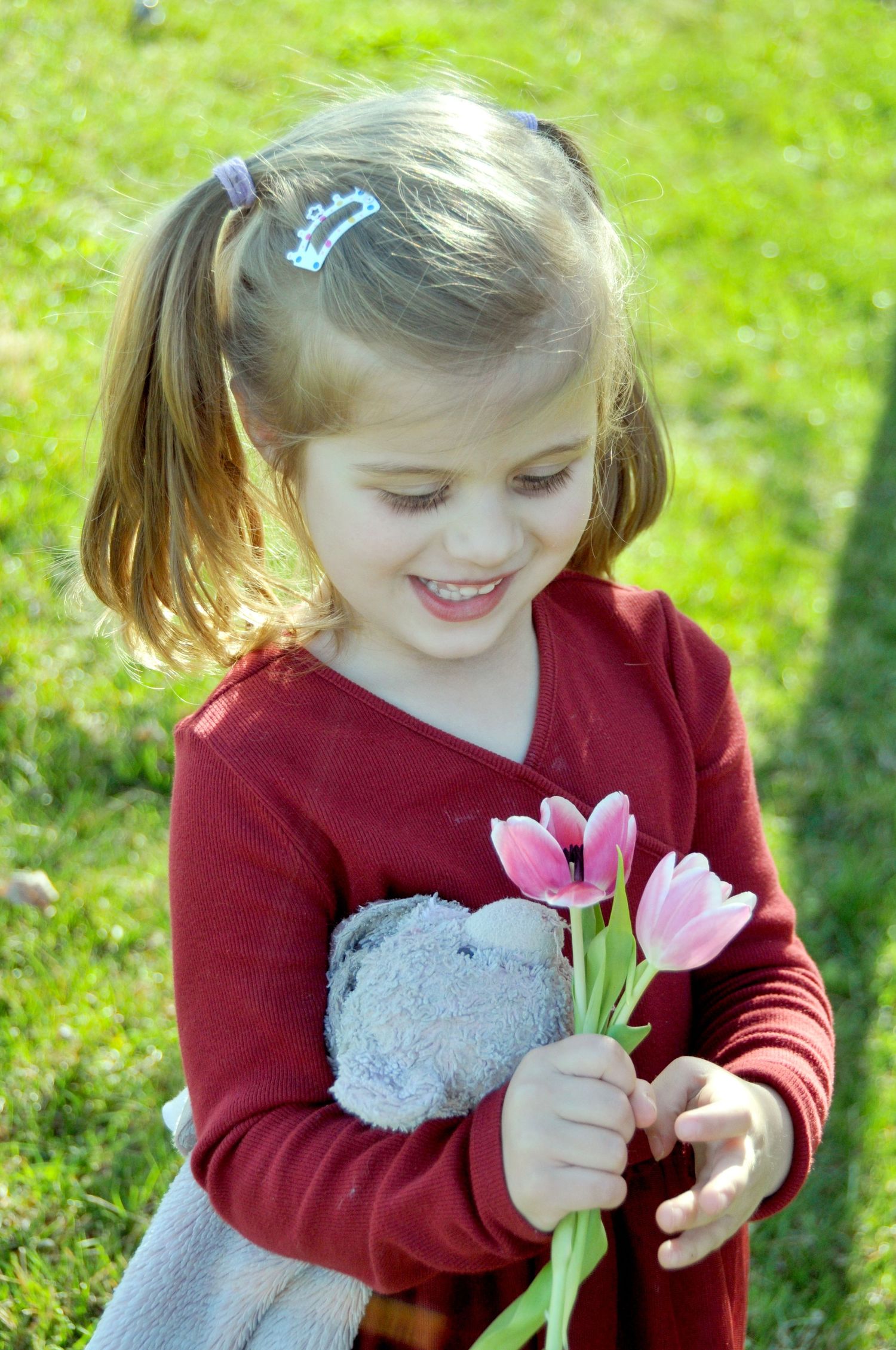 image of girl holding tulips in spring