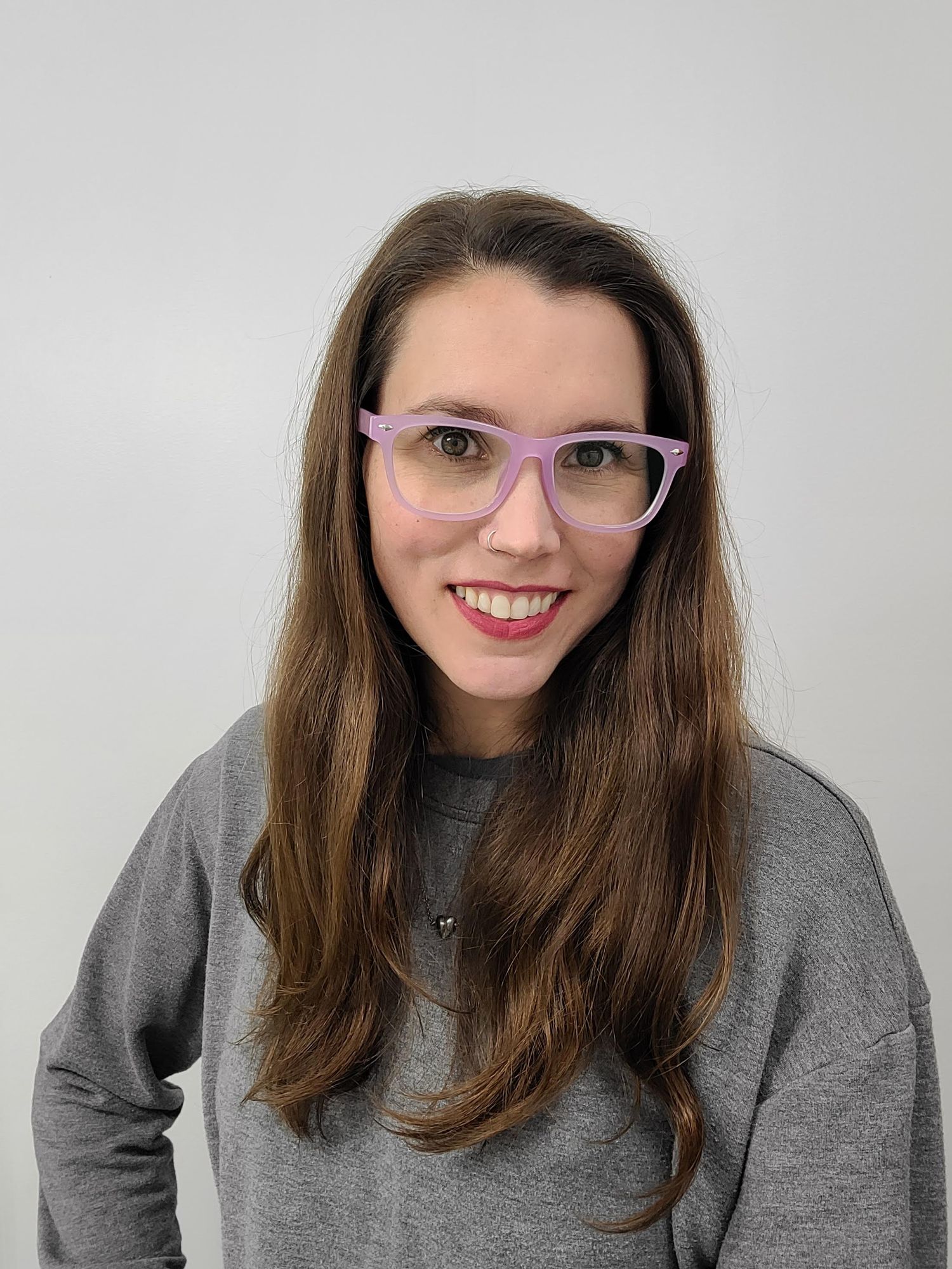 Portrait of Sarah Peez the photographer smiling.
