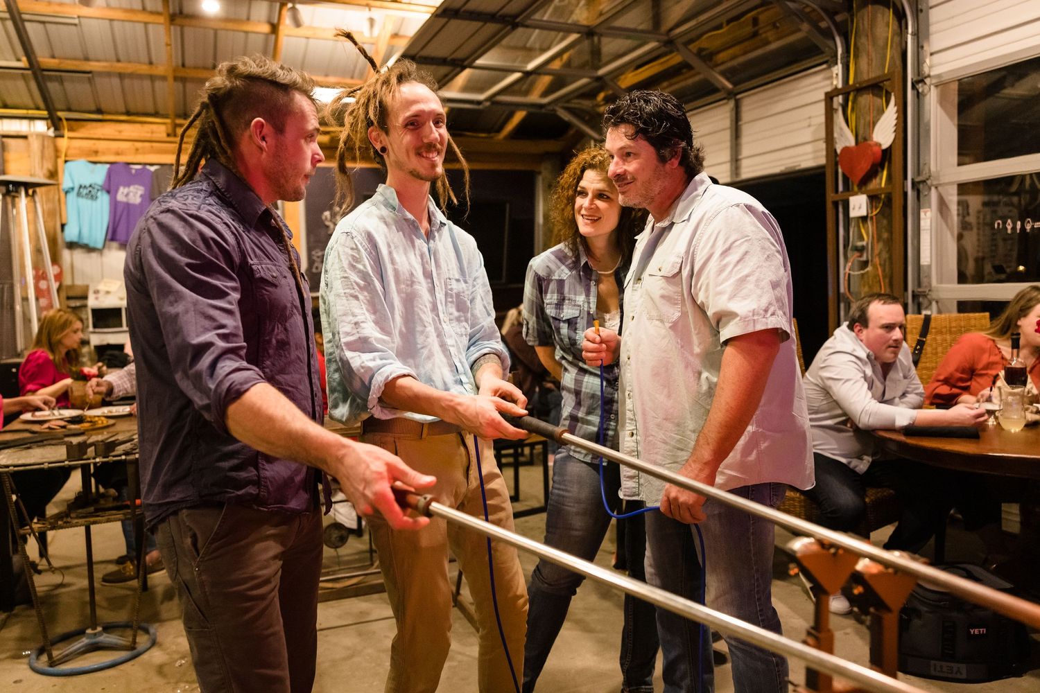 People mingling and socializing at an indoor event space.