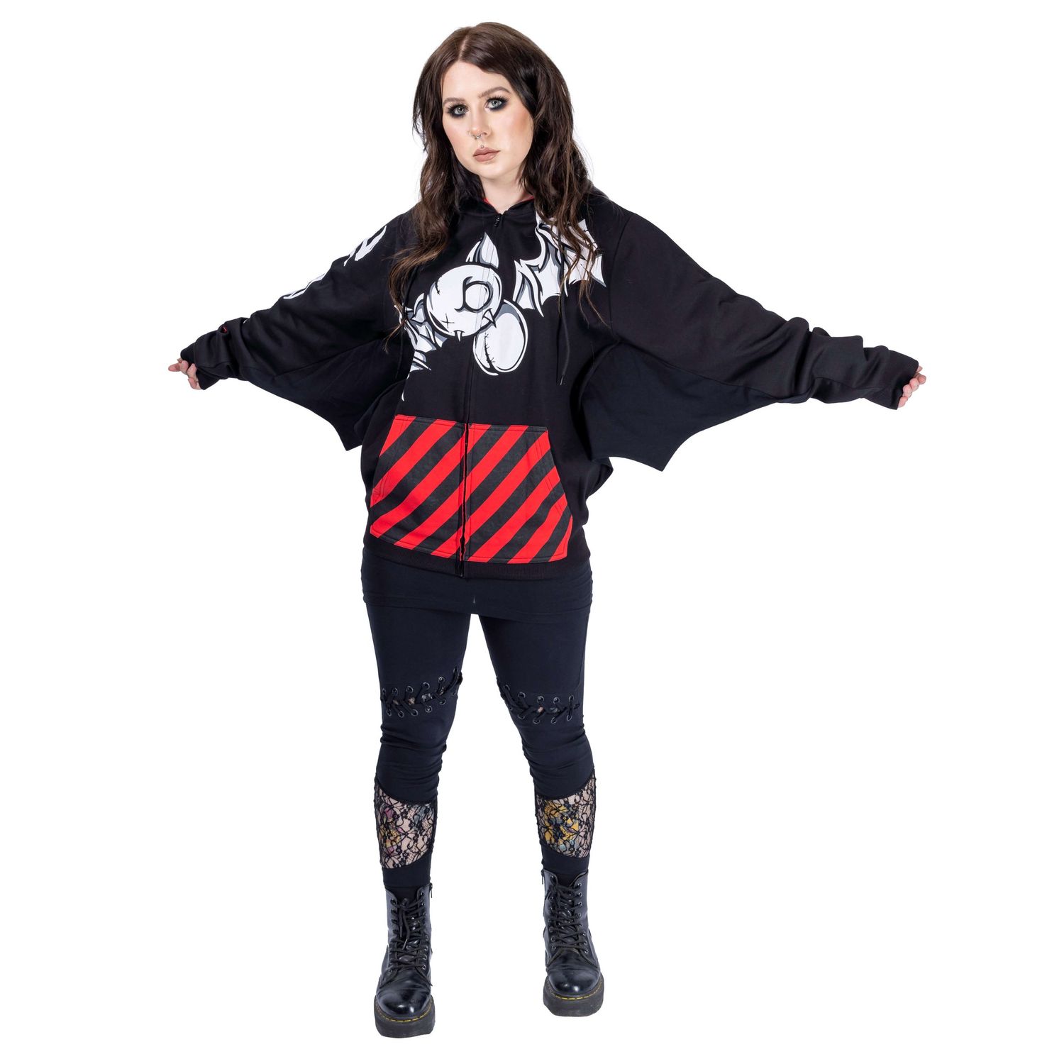 model with dark hair and makeup posing in gothic hoodie for Innocent Clothing shot by Amy Davies in Hove