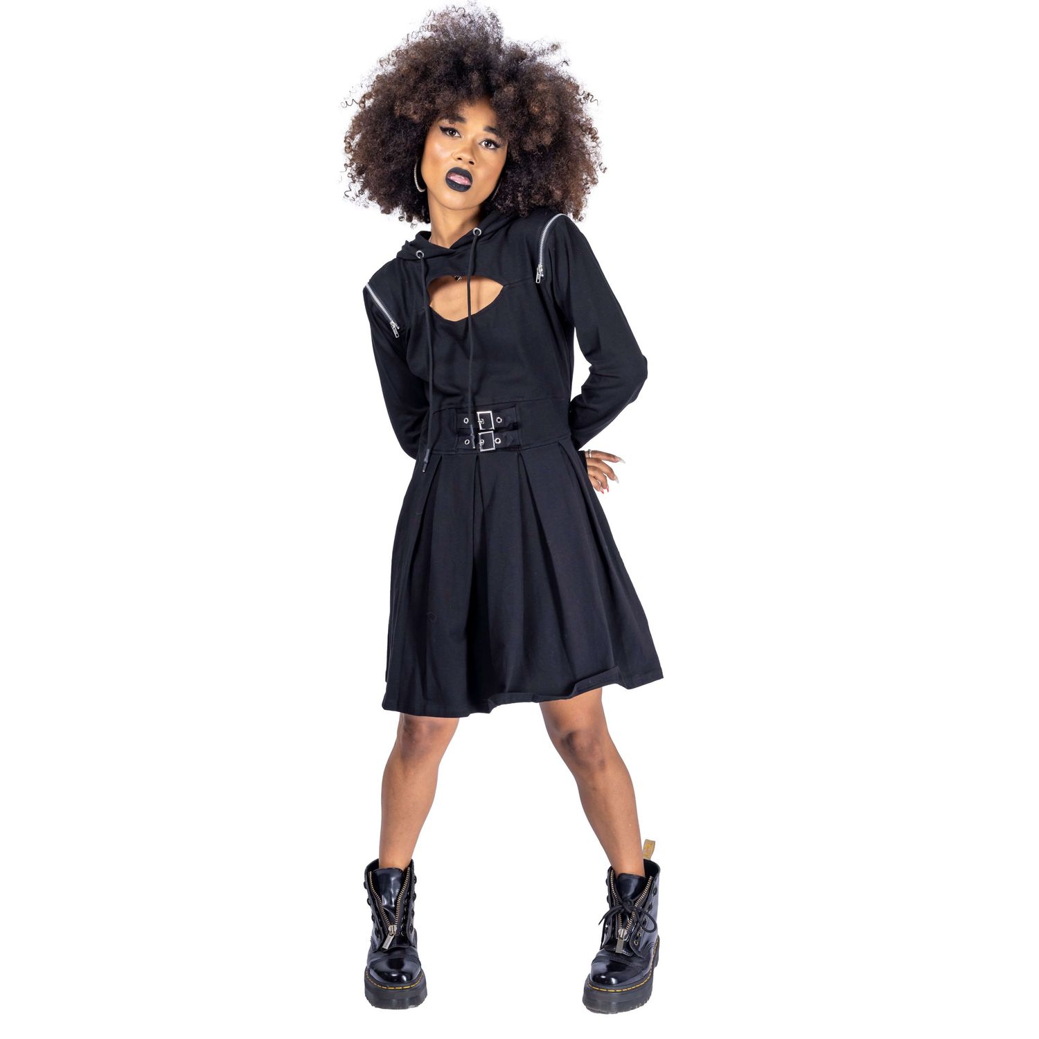model with afro hair and dark makeup posing for Innocent Clothing in goth dress and boots shot by Amy Davies in Hove