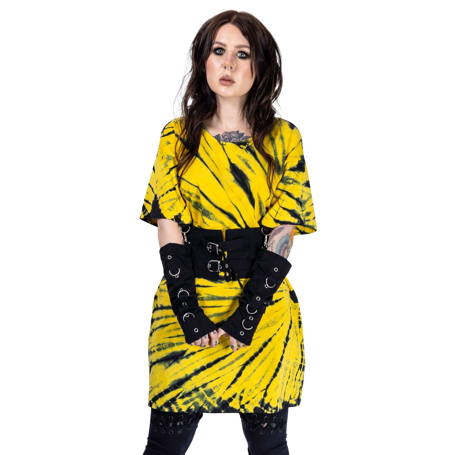 tattooed model with dark hair and makeup wearing yellow goth style top for Innocent Clothing shot by Amy Davies in Hove