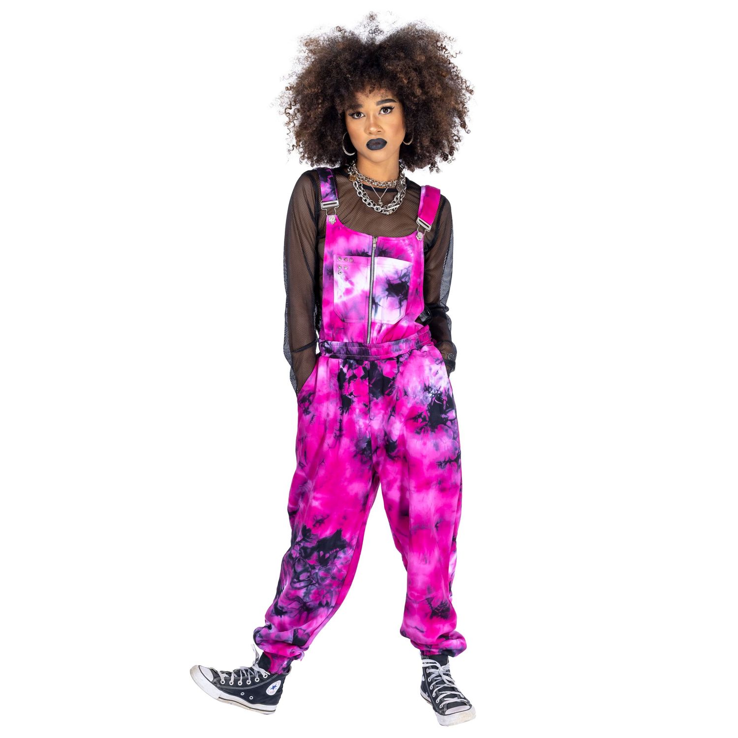 model with dark makeup and afro hair posing in pink goth style outfit for Innocent Clothing shot by Amy Davies in Hove
