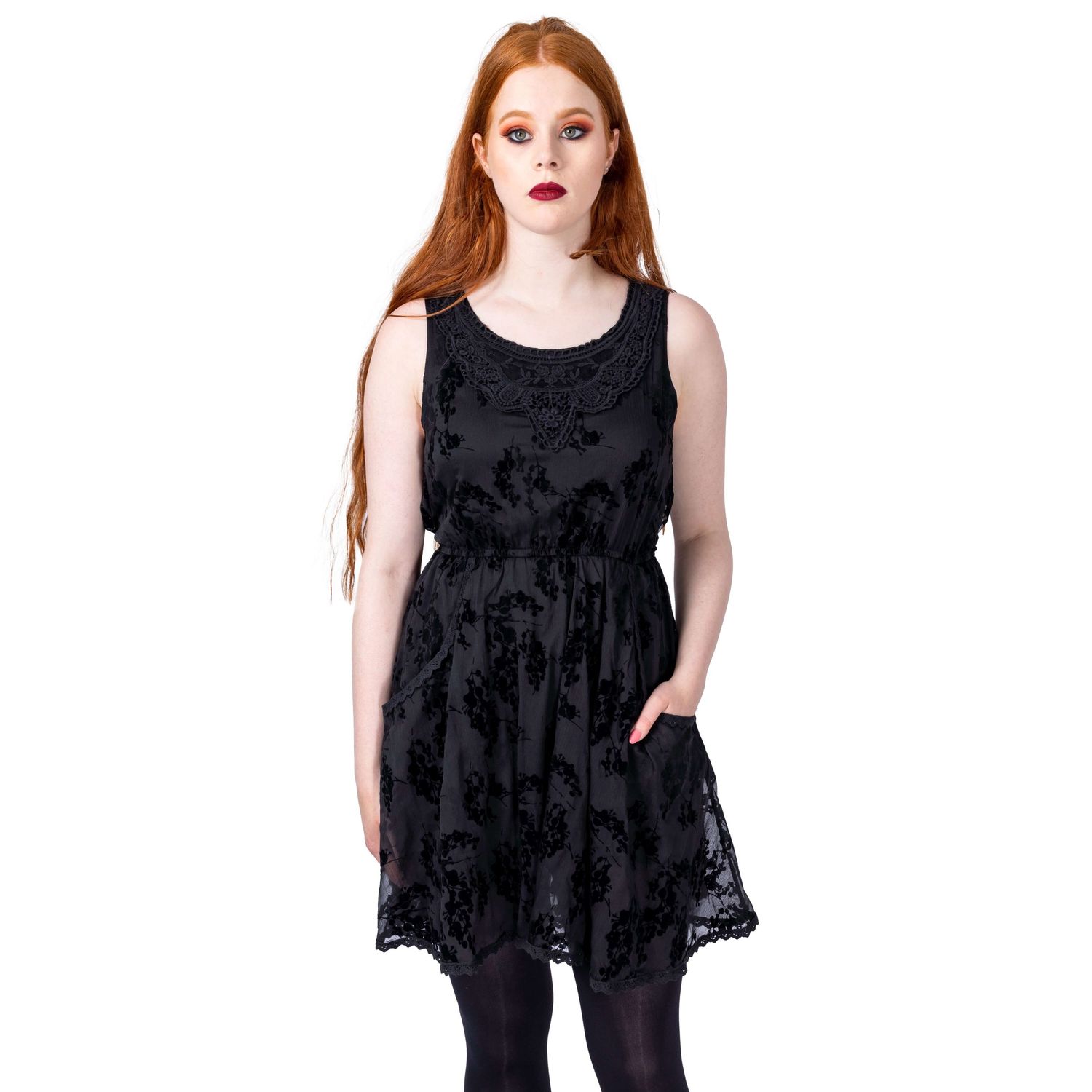 model with long ginger hair and red lipstick wearing gothic black dress shot by Amy Davies for Innocent Clothing in Hove