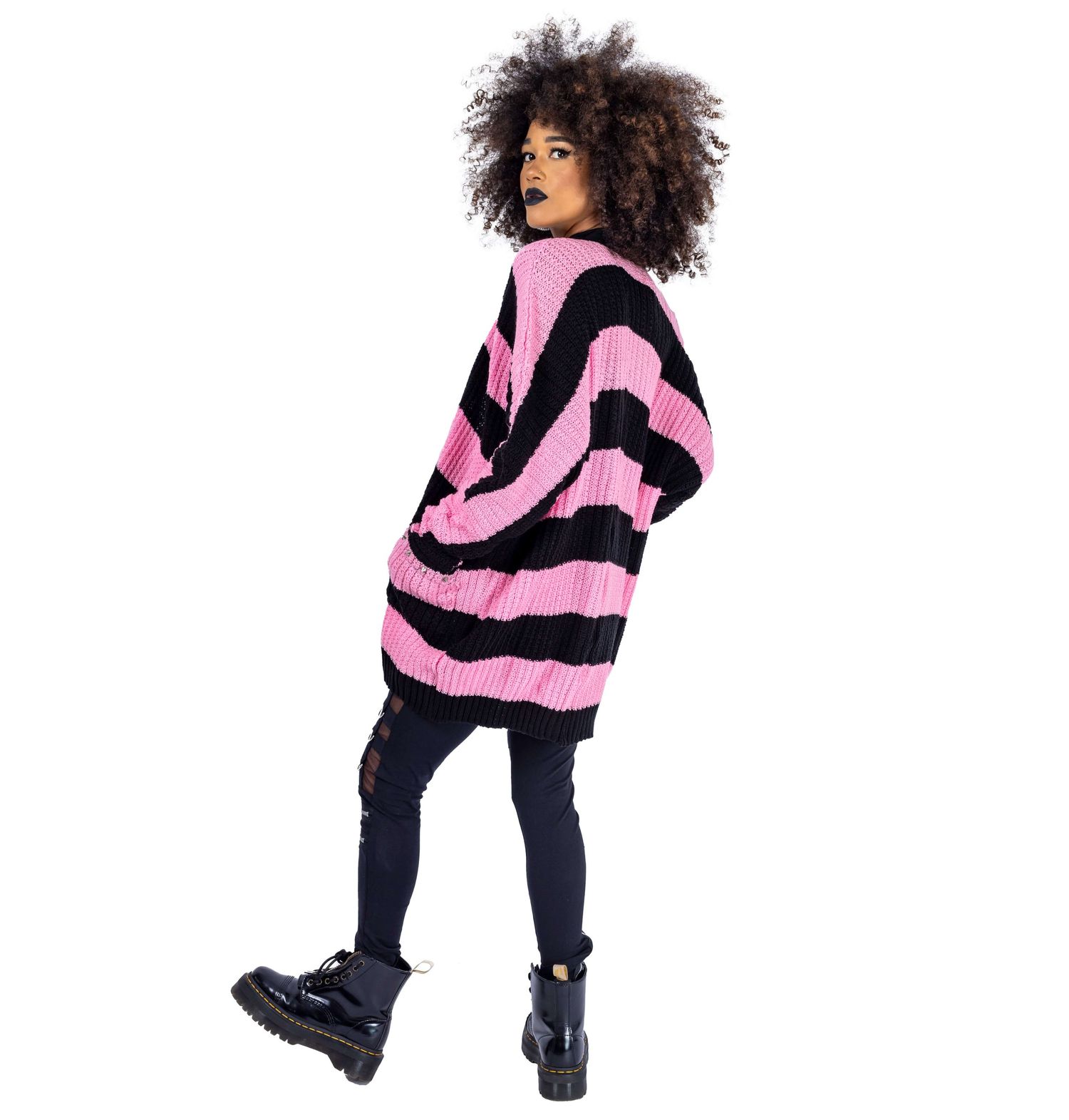 model with brown afro hair and black lipstick wearing gothic jumper shot by Amy Davies for Innocent Clothing in Hove
