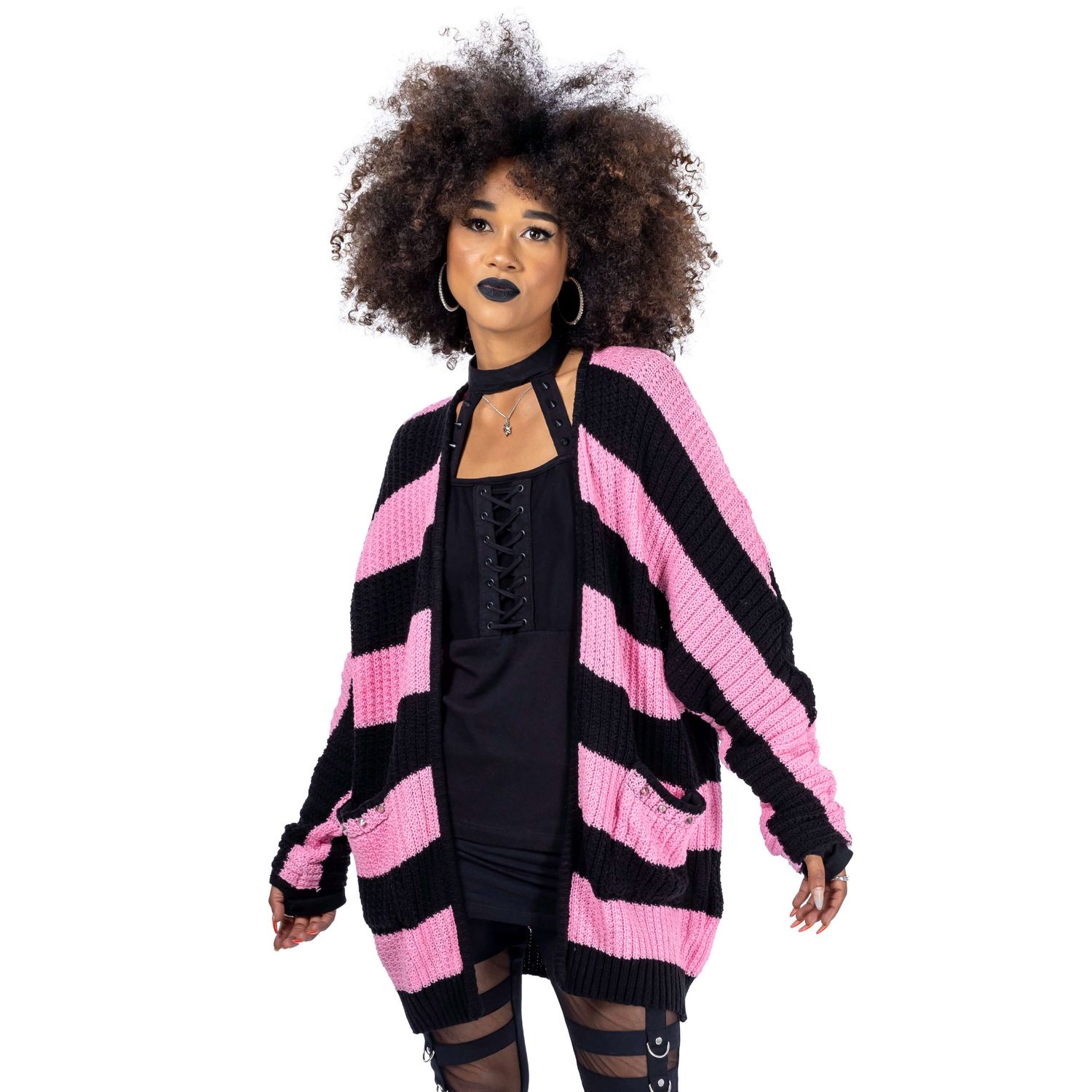 model with brown afro hair and black lipstick wearing gothic jumper shot by Amy Davies for Innocent Clothing in Hove