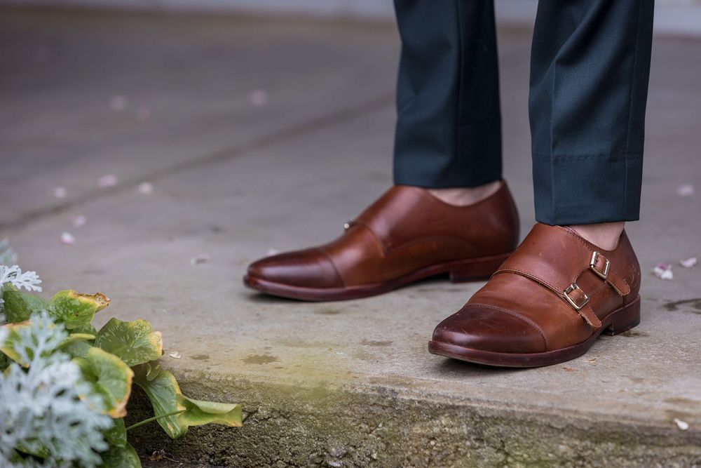 Groom in a Green wedding suit and brown leather shoes before his St.Leonards Vineyard winery wedding