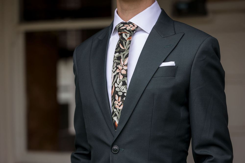 Groom in a Green wedding suit before his St.Leonards Vineyard winery wedding in Wahgunyah
