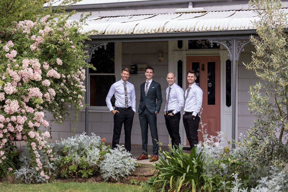 Groom in a Green wedding with his Groomsmen before his St.Leonards Vineyard winery wedding in Wahgunyah