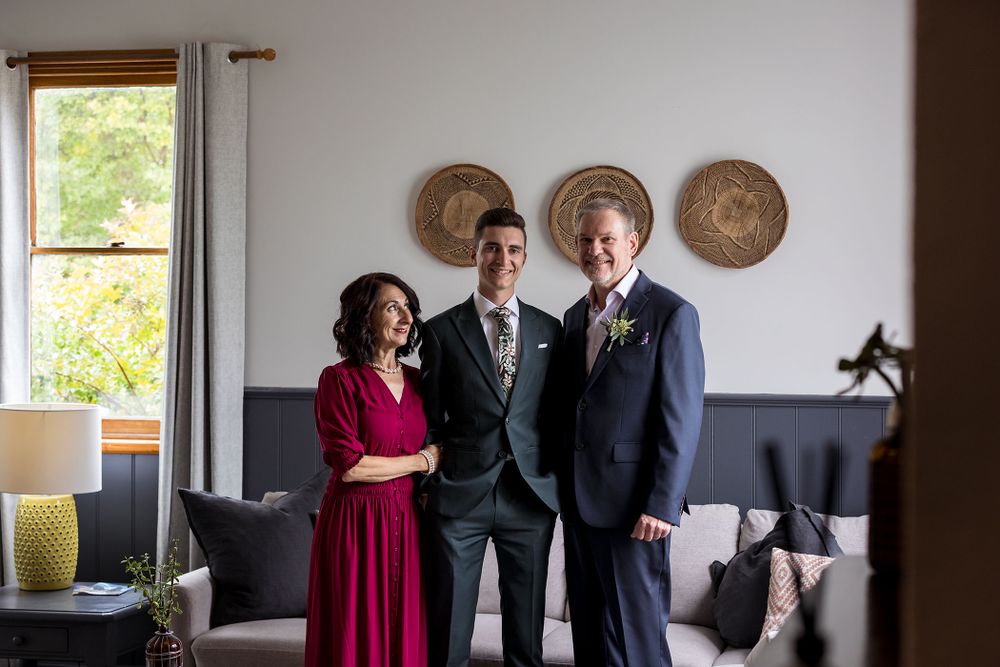 Groom sharing a moment with his Mum and Dad before his wedding at St.Leonards Vineyard winery wedding in Wahgunyah