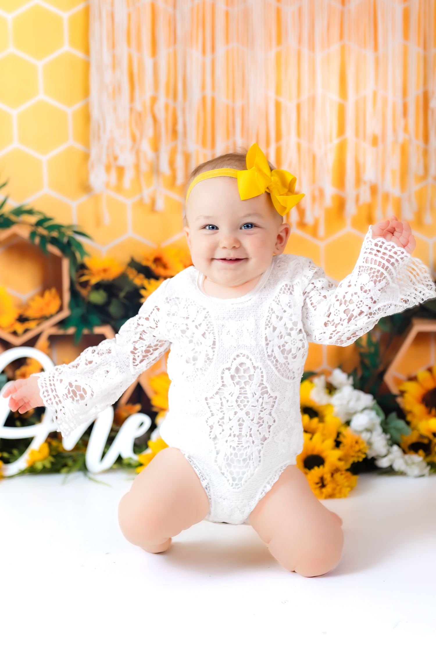 Family photographer 1st birthday milestone photo yellow sunflower