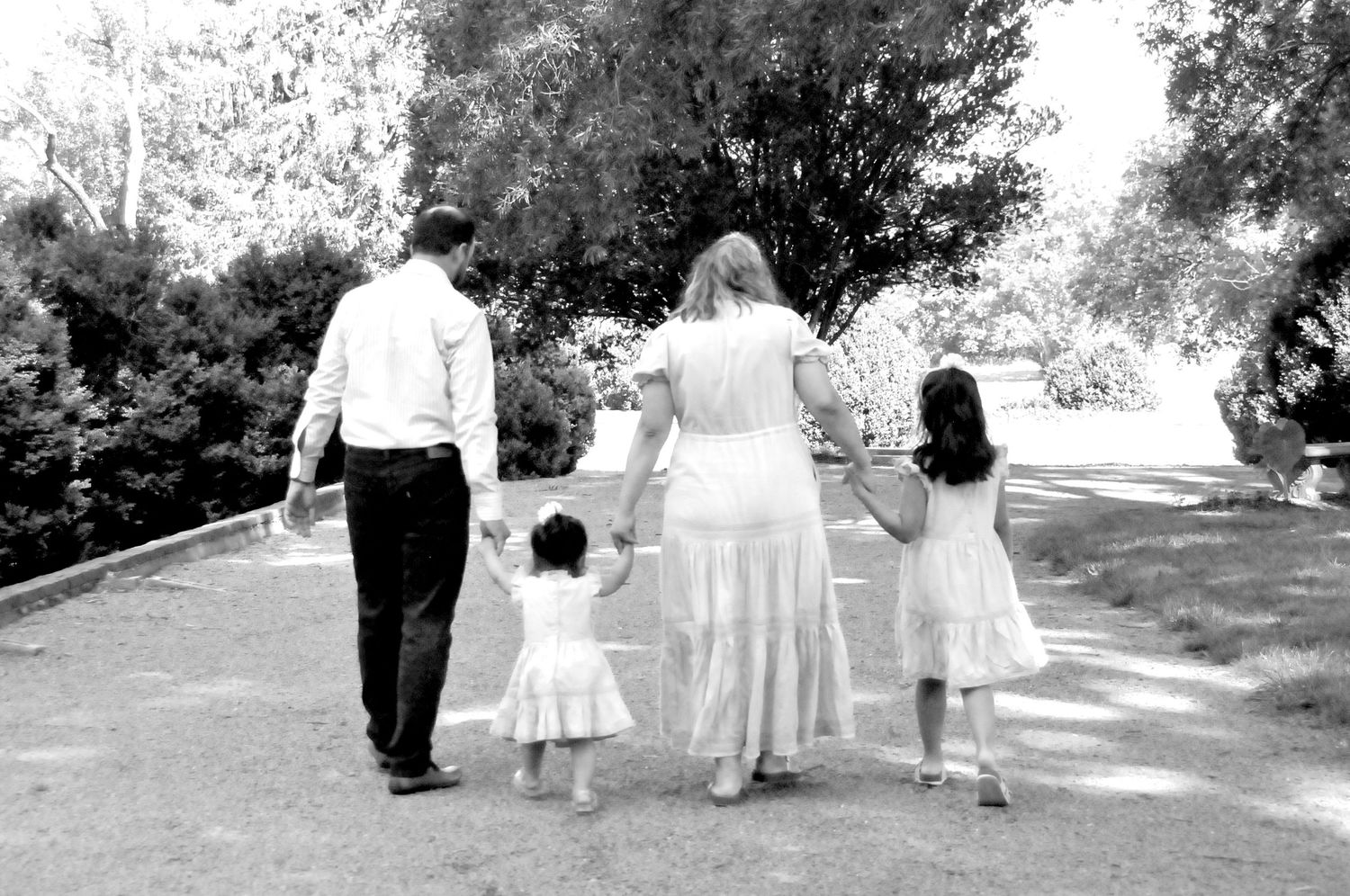black and white image of family walking Morven Park