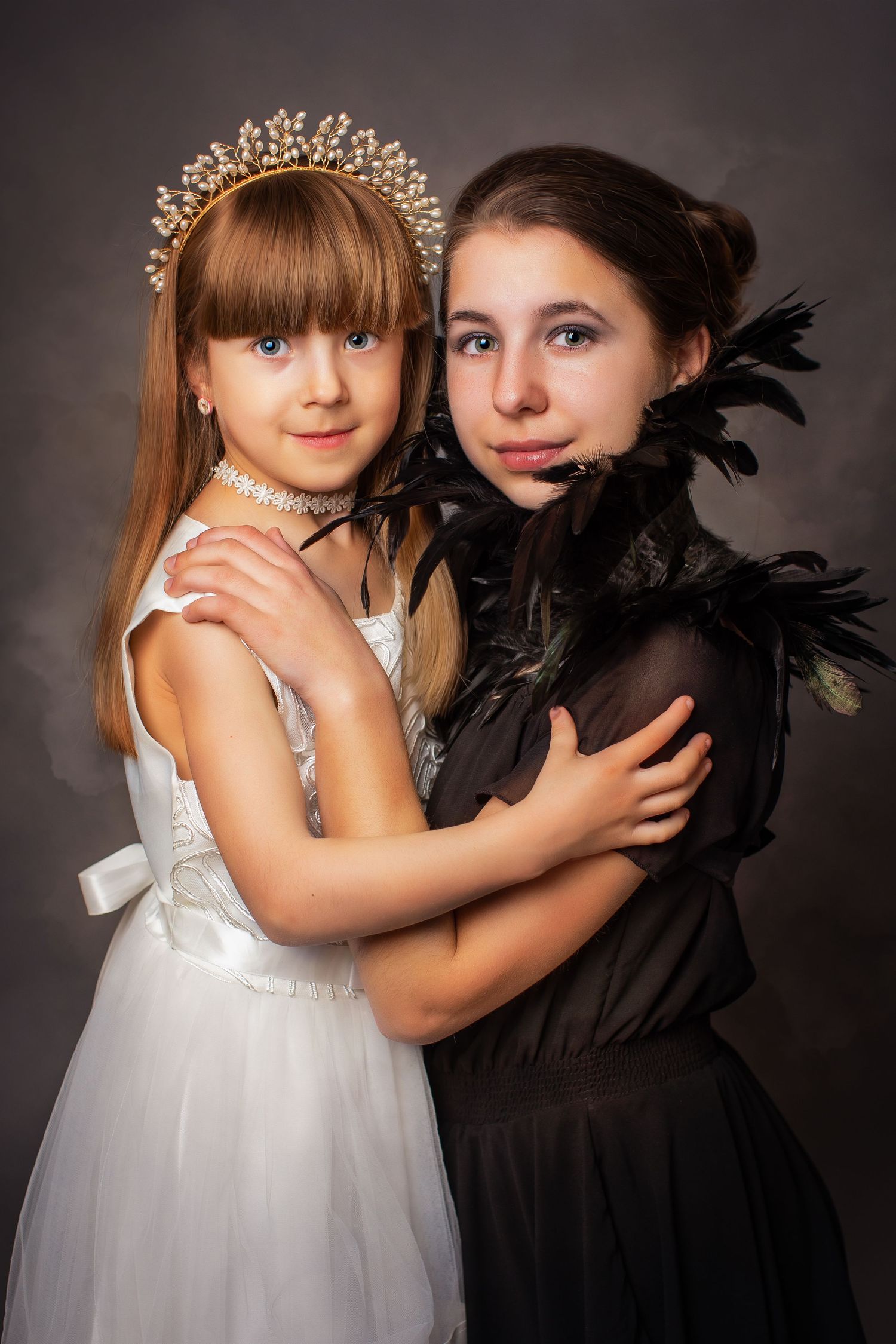sister sibling in a black dress and white dress
