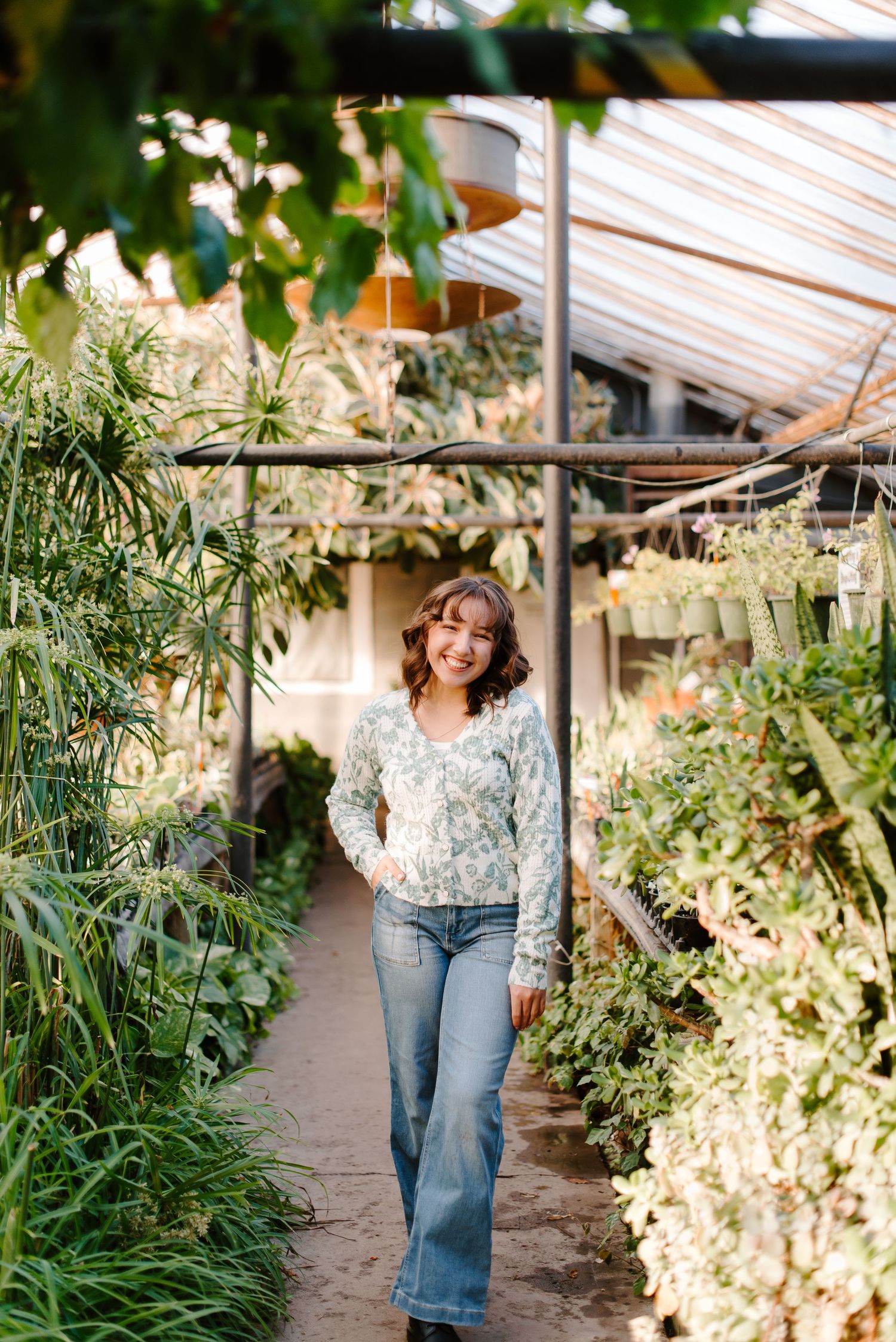 Derby high school senior pictures taken at local library and greenhouse in Wichita, KS