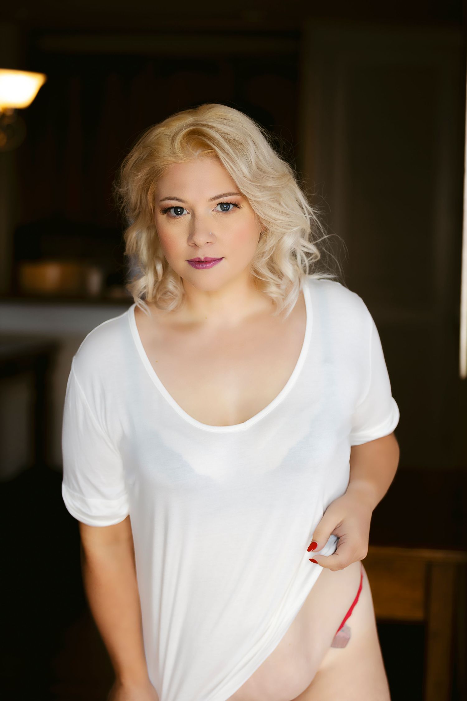 Boudoir playful shirt tug