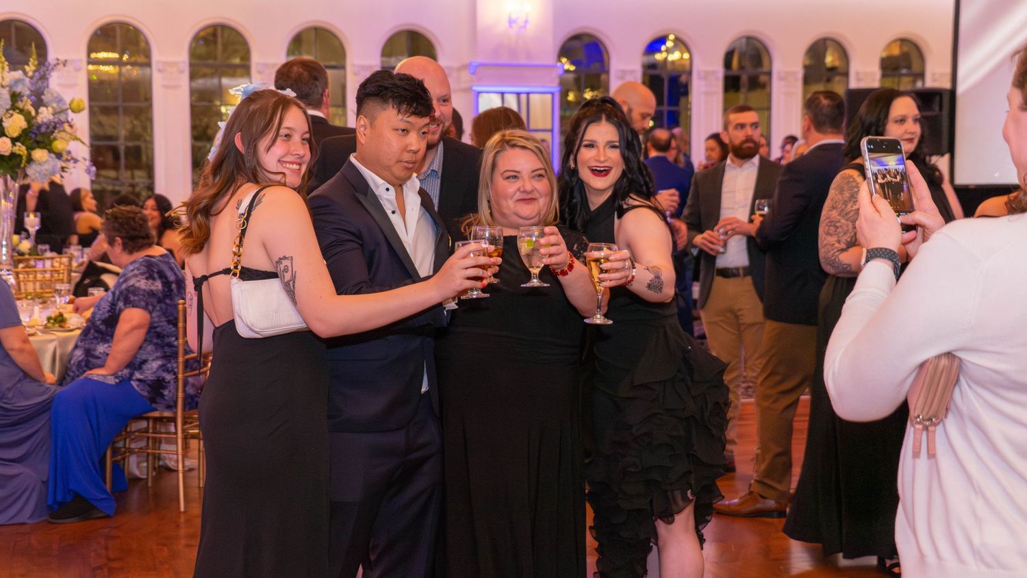 A Happy Group at an event taking a photo together