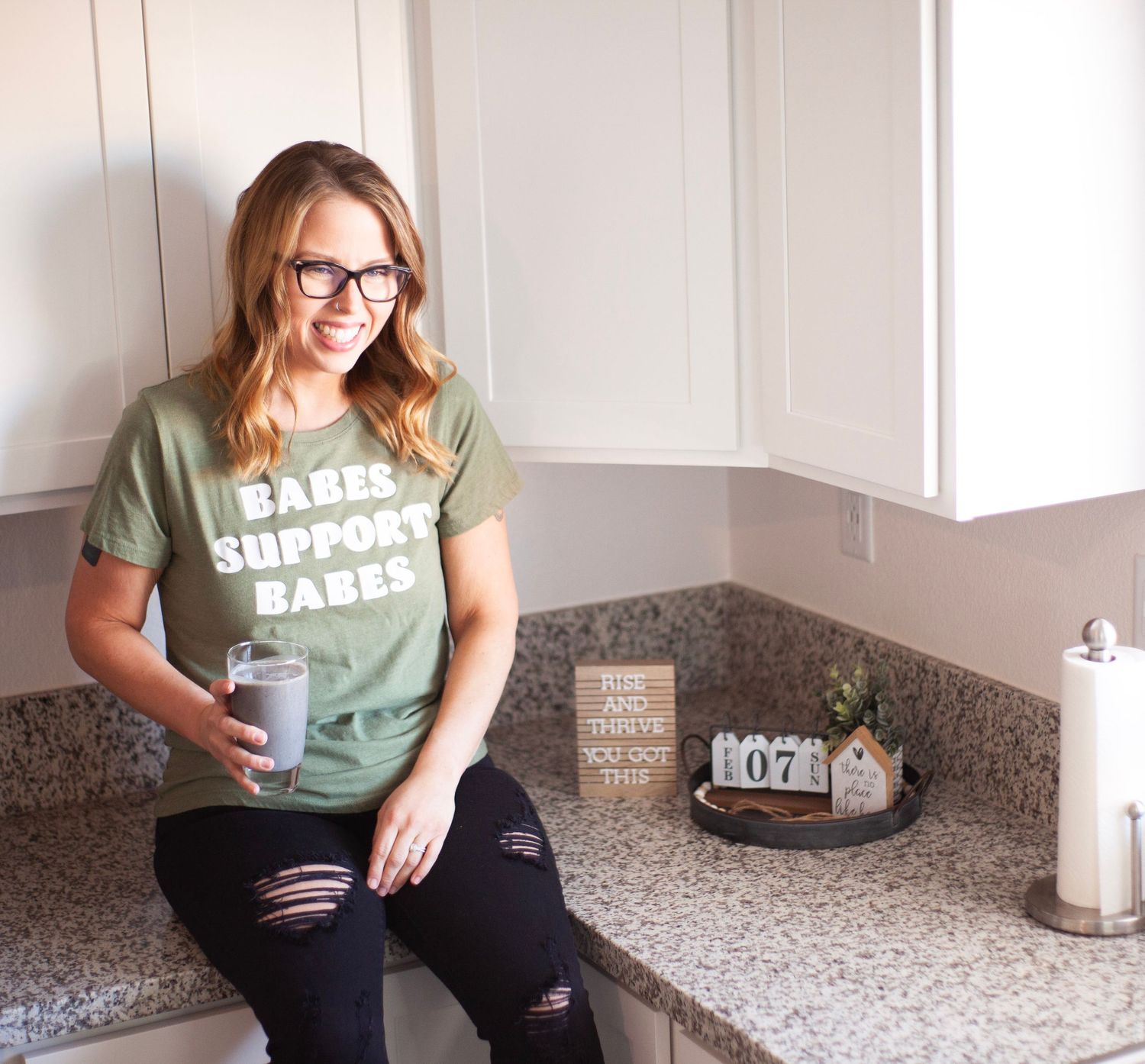 woman on counter drink a shake, female business owner, mother, young woman, personal branding session, personal branding