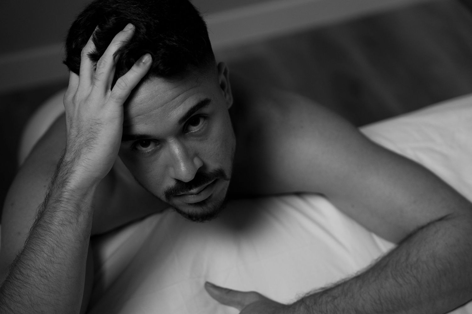 Intimate black and white portrait series with natural lighting.