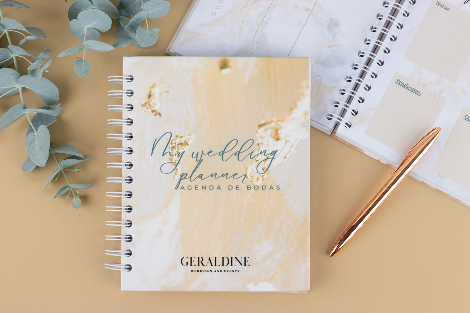 Elegant stationery and business cards with gold foil details and eucalyptus leaves.