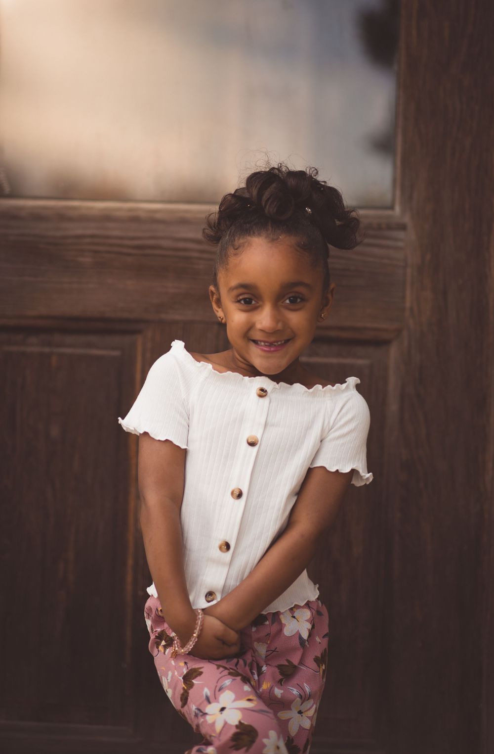 Child smiling in sunlight