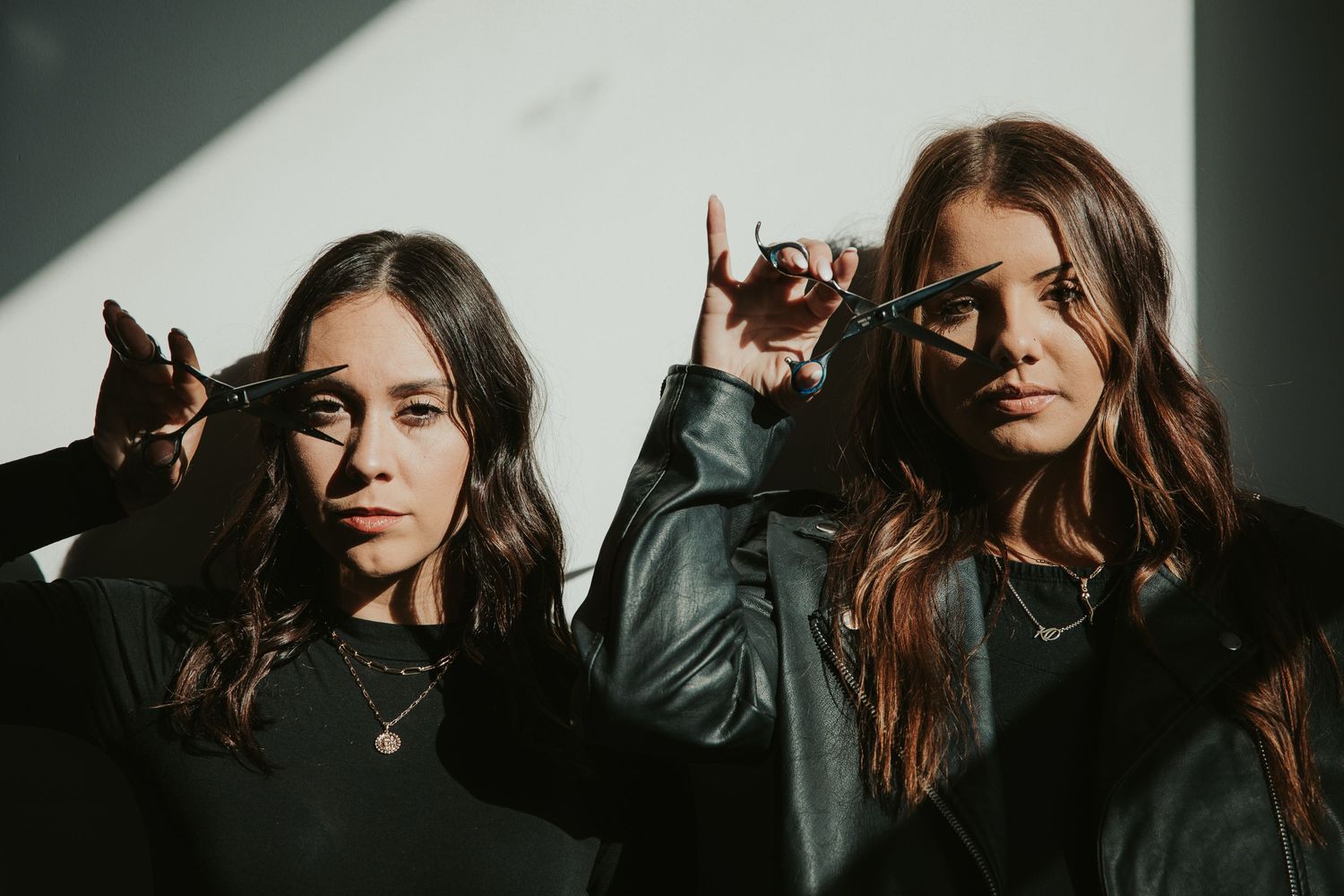 Dramatic portrait series with moody lighting and leather jacket aesthetic.