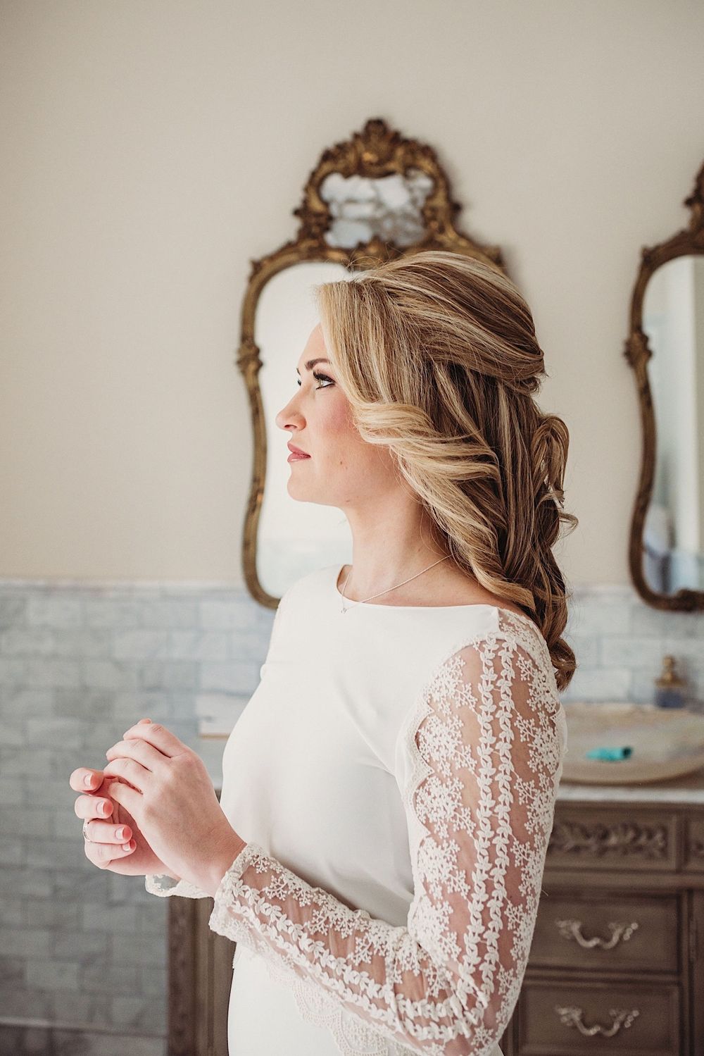 Bride standing in front of a mirror at the Orlo in Tampa