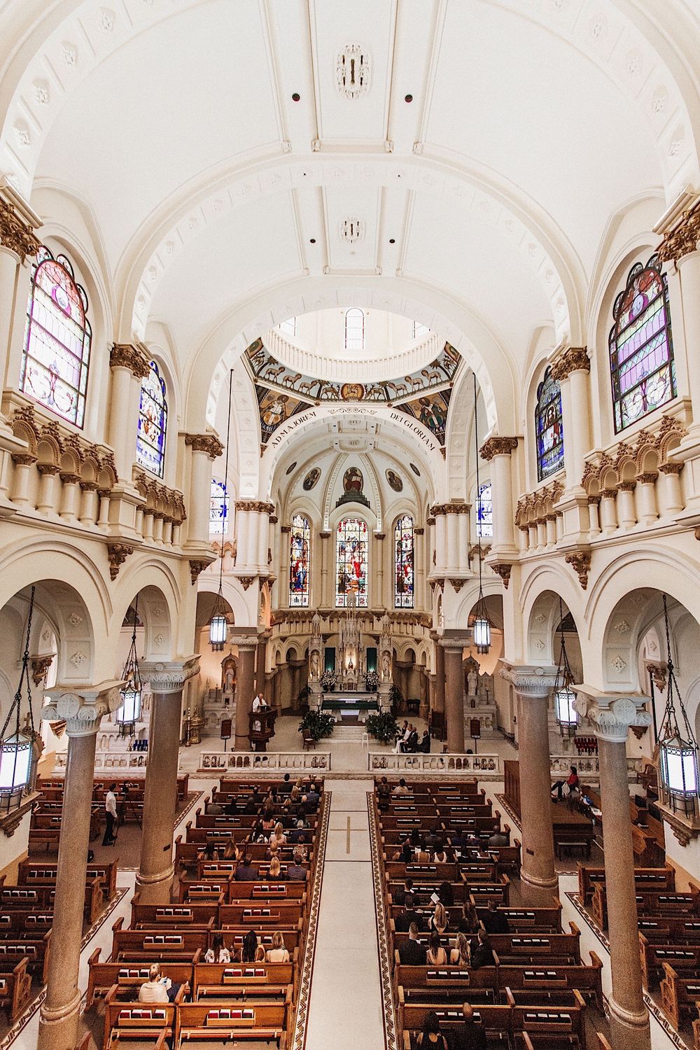 Interior of Sacred Heart Church in Tampa showing the stained glass