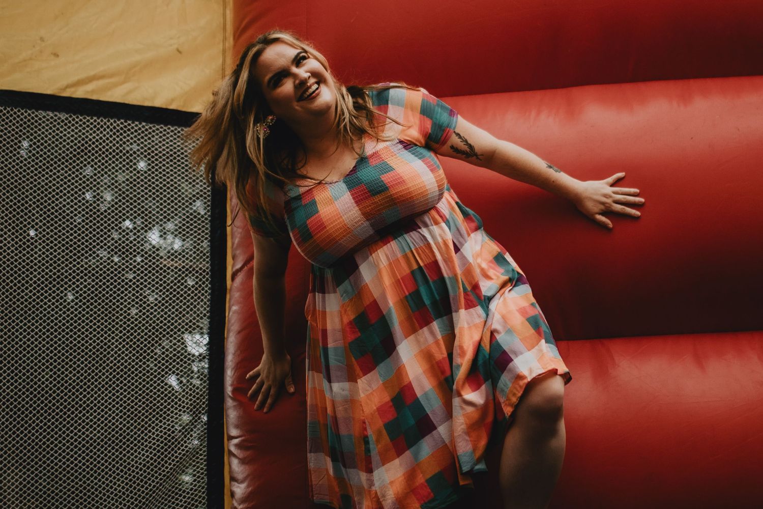 girl smiling in a bounce house