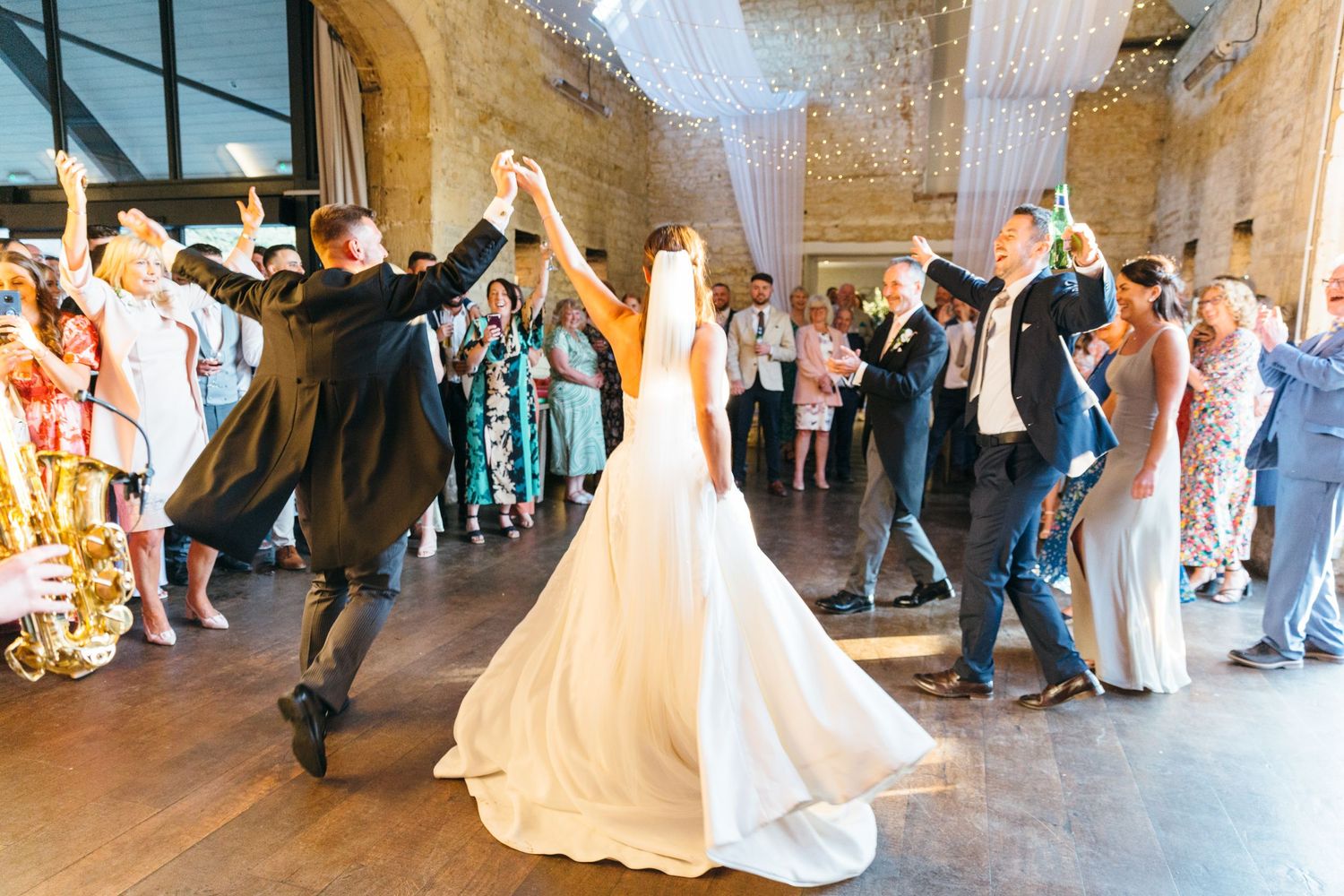 Hayley Elizabeth Photography Cotswolds wedding photographer dancing at lapstone barn in the evening